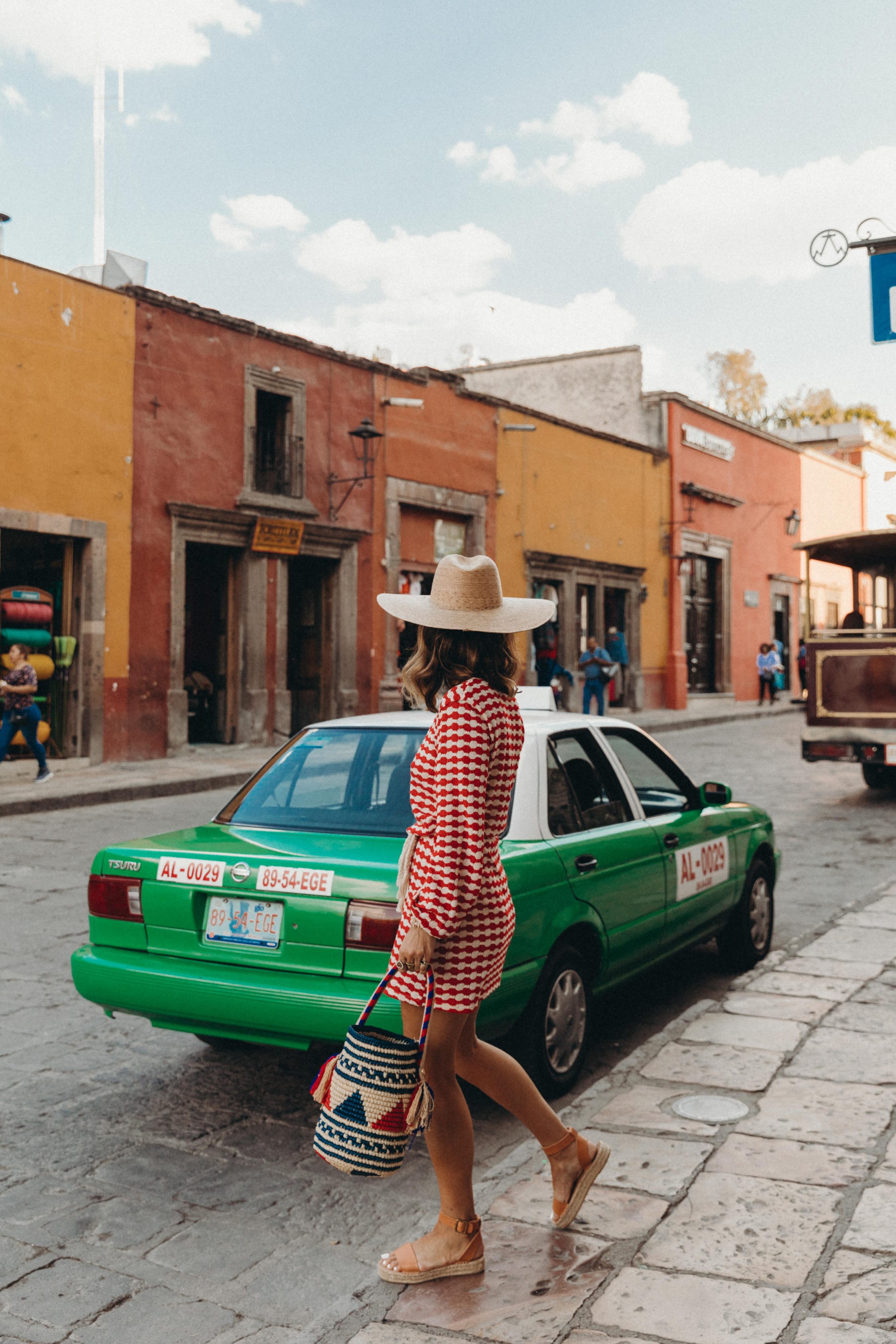 Sara of Collage Vintage wearing a red dress from Zara and leather espadrilles at San Miguel de Allende