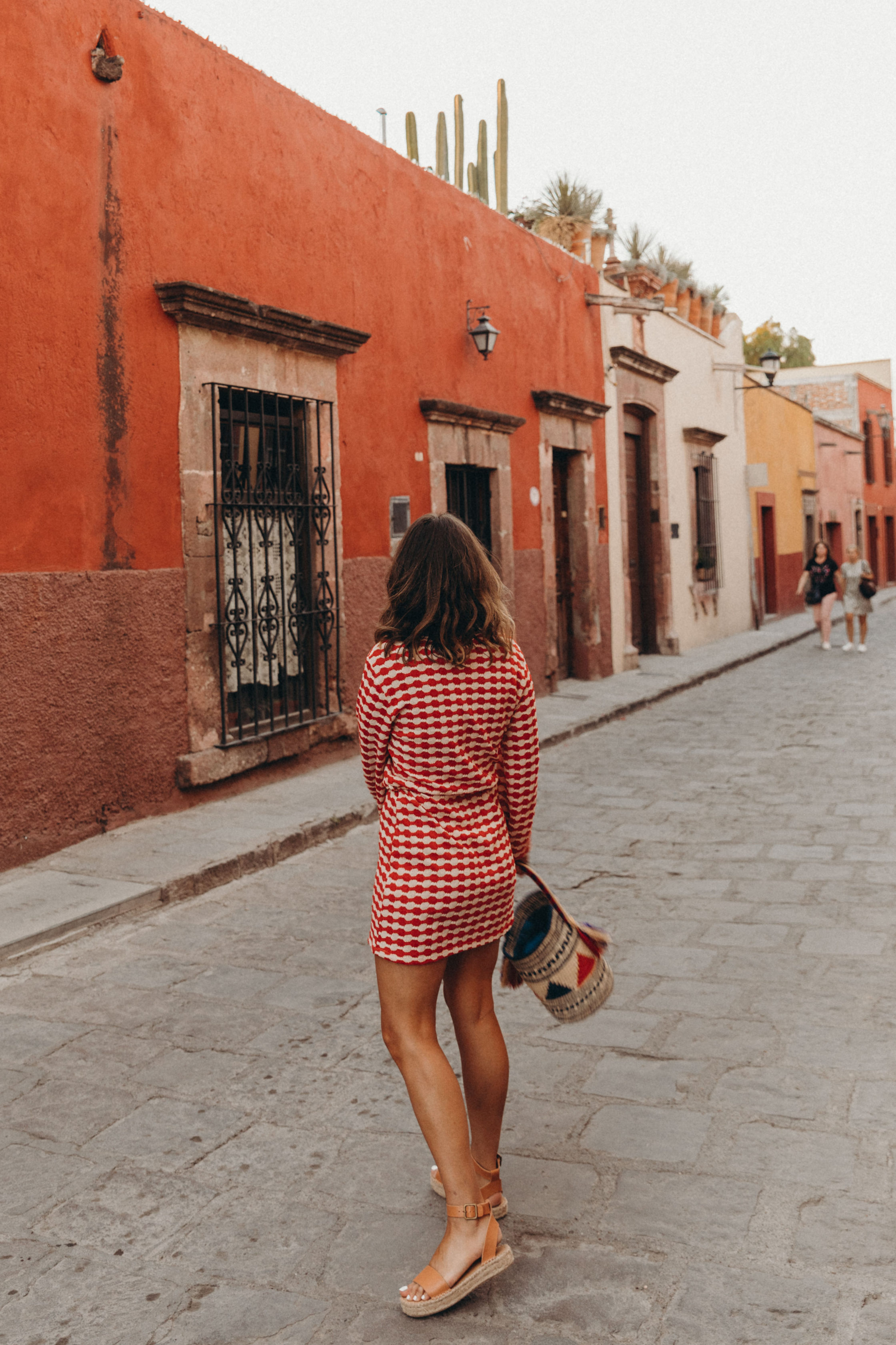 Sara of Collage Vintage wearing a red dress from Zara and leather espadrilles at San Miguel de Allende