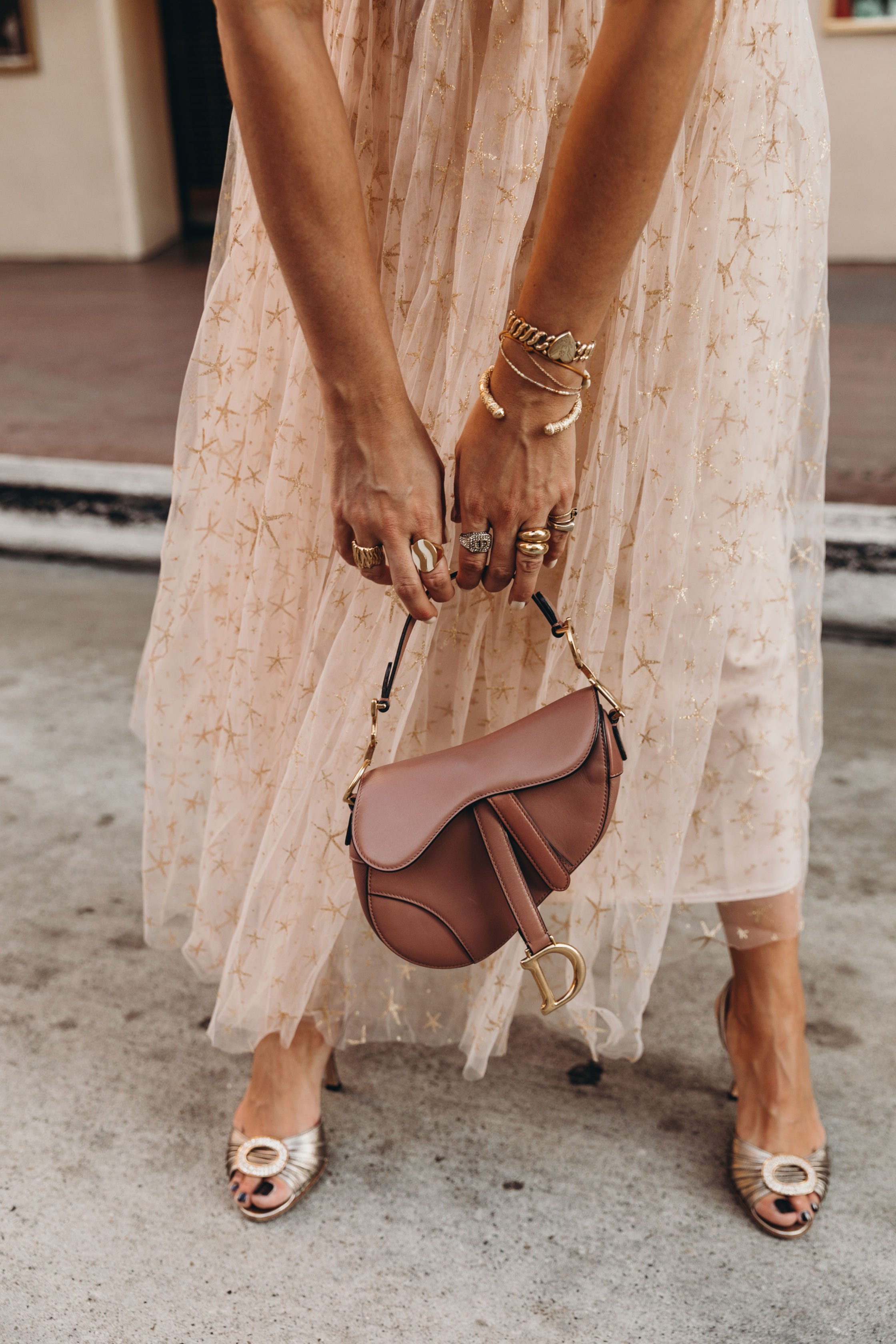 Party outfit wearing a Champagne tulle dress and Manolo Blahnik sandals