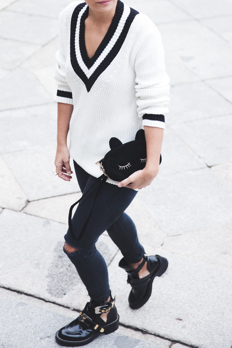 Varsity_Jersey-Black_Jeans-Balenciaga_Cut_Out_Boots-Black_Jeans-Cat_Bag-Outfit-Street_Style-23