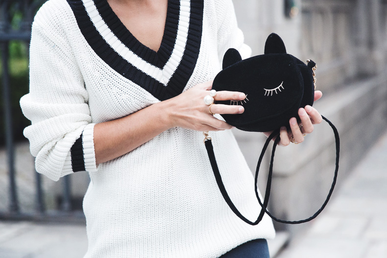 Varsity_Jersey-Black_Jeans-Balenciaga_Cut_Out_Boots-Black_Jeans-Cat_Bag-Outfit-Street_Style-47